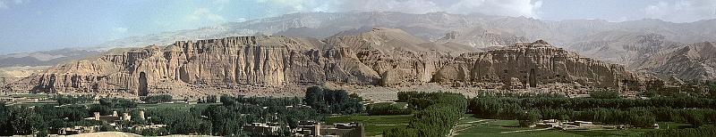 India-8d-Foliot-1975.jpg - Panorama of the northern cliff of the Valley of Bamyan, with the Western and Eastern Buddhas at each end (before destruction), surrounded by a multitude of Buddhist caves; extracted from the two Photos of Françoise Foliot 1975; source: Wikimedia Commons, accessed 28 June 2022; https://en.wikipedia.org/wiki/Buddhas_of_Bamiyan#/media/File:Valley_of_Bamiyan_panorama.jpg