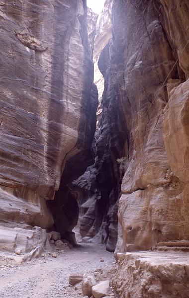Jordan-10-Seib-1980.jpg - The Siq, the ancient main entrance leading to the city of Petra, starts at the Dam and ends at the opposite side of the vault, at Al-Khazneh, the Treasury, split rock with a length of about 1200m and a width of 3 to 12m (photo by Roland Seib)