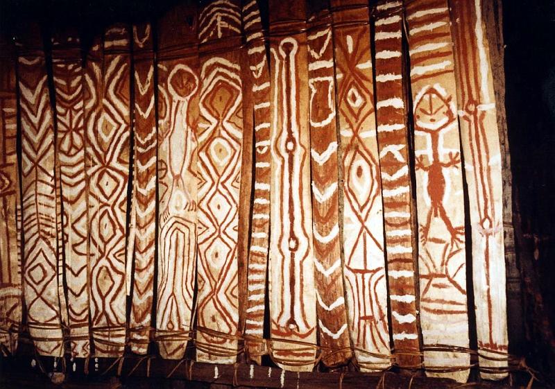 Papua1-24-Zoellner.JPG - Ornaments inside men’s house in Pasikini, Angguruk area, Yahukimo regency, Highlands The two human figures represent a young men from this house killed in ambush and the enemy killed about ten years later by brothers of the victim (1967)(Photo by Siegfried Zöllner)