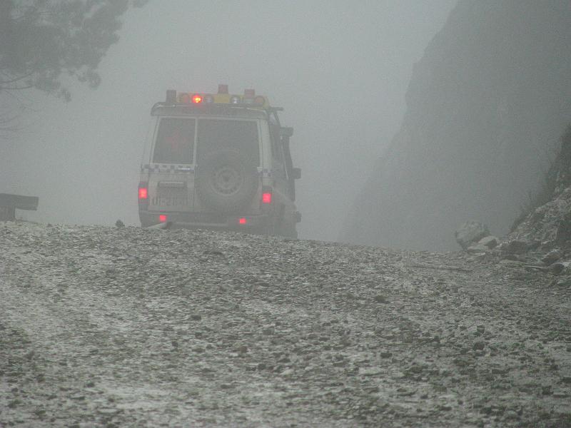 Papua2-02-Zoellner-2008.jpg - To get up to the mining town of Tembagapura, service cars have to drive up the 100km long supply road - often through mud and clouds and mist (Photo by Siegfried Zöllner)