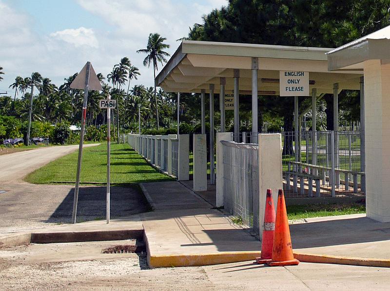 Tonga-44-Seib-2011.jpg - Bus stop at the High School of the fundamentalist Church of Jesus Christ of Latter-Day Saints outside of Nuku´alofa (Photo by Roland Seib).